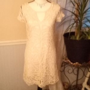 BCBGMAXAZRIA crocheted ivory coloured cocktail length dress short sleeve